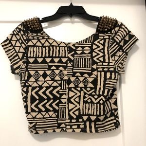 Geometric crop top with studded shoulders